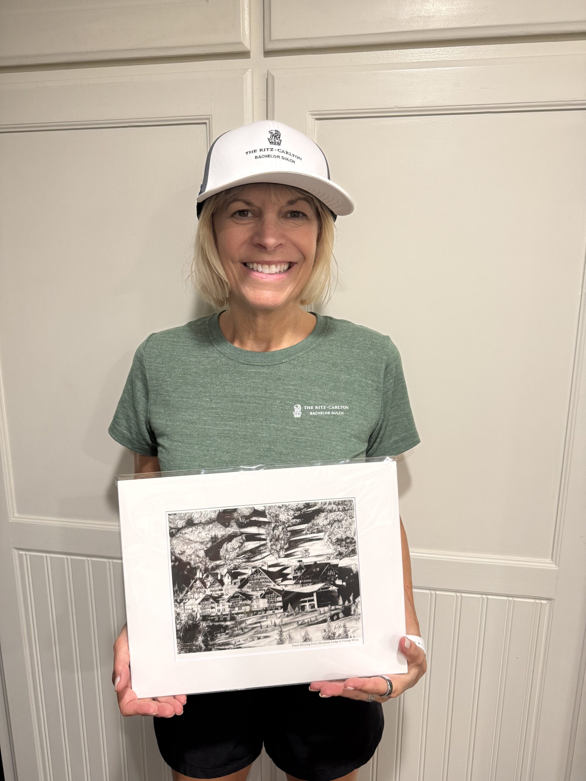 Linda holding her Mountain Lodge in Vintage Hives print