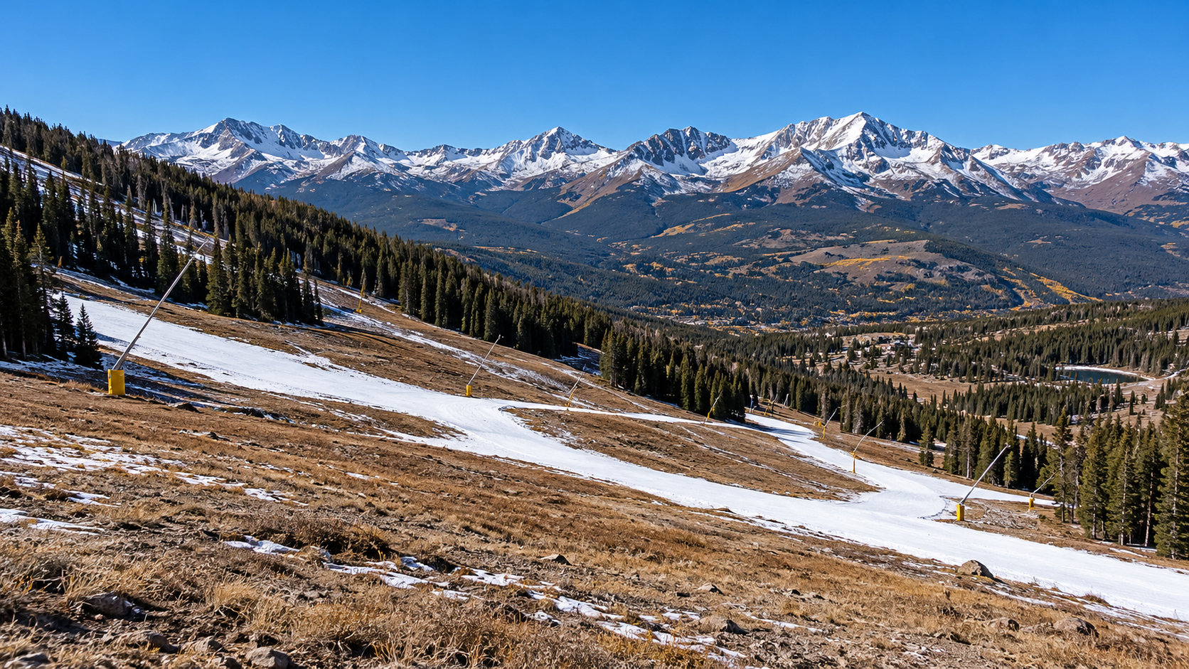 Illustration of narrow snowmaking strips on a Colorado ski slope before the winter season.